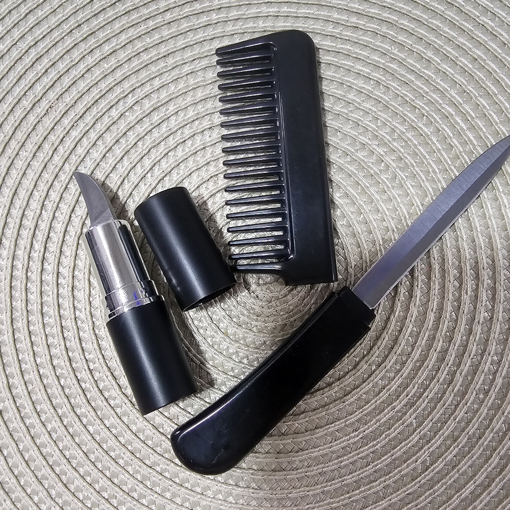 Lipstik with knives and black comb